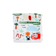 Folded up Baby blanket - Rust Ellie featuring vibrant African animal prints, including elephants, crocodiles, monkeys, and plants, on a white cotton background.