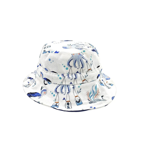 Bucket Hat – Otto the Octopus reversible cotton sun hat with blue octopus ocean print and blue and white stripes on the reverse