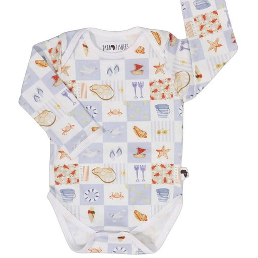 Long-sleeve baby onesie with blue and white seaside print featuring boats, crabs and starfish.