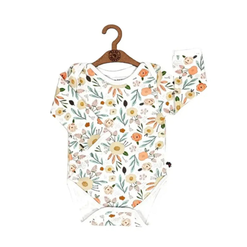 Classic Onesie – LS – Oh So Pretty, long-sleeved baby onesie made from 95% cotton and 5% lycra, white base with soft floral print in peach and blush tones, front view