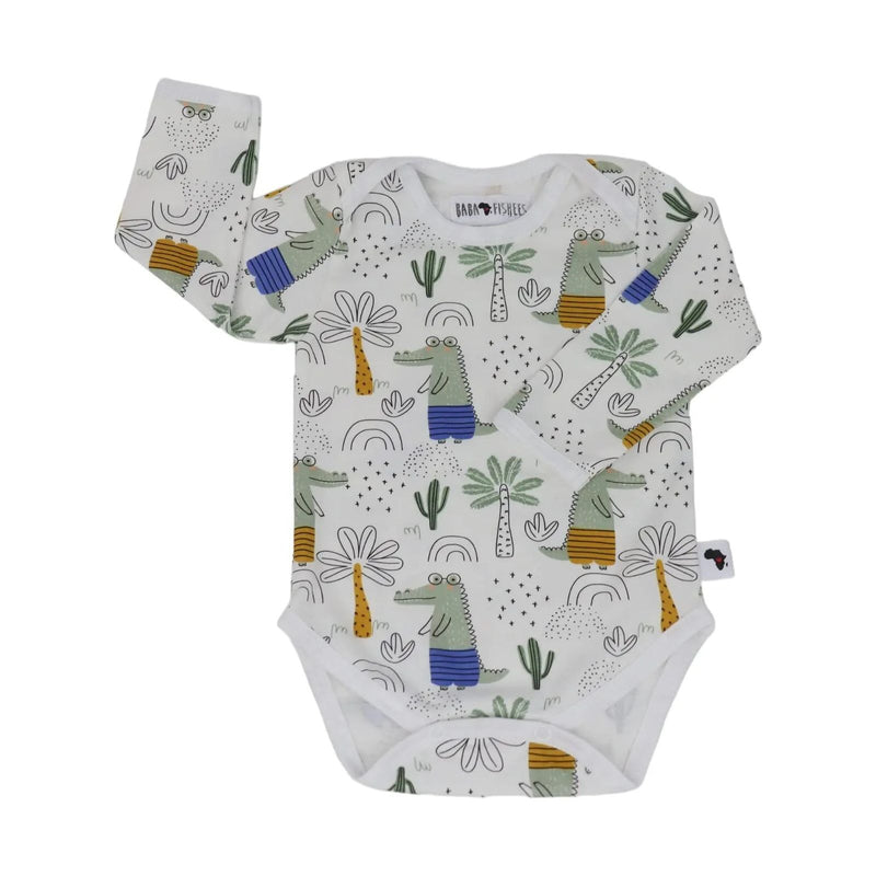 Classic Onesie – LS – Walking Croc, long-sleeved baby onesie made from 95% cotton and 5% lycra, white base with crocodile, palm tree and abstract print, front view