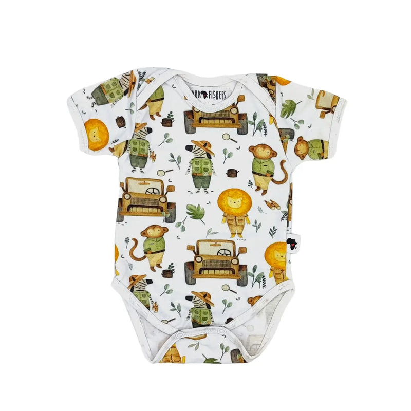 A short-sleeve baby onesie featuring a playful safari print with lions, zebras, and monkeys in jeeps on a white background, made from soft 95% cotton and 5% lycra fabric.