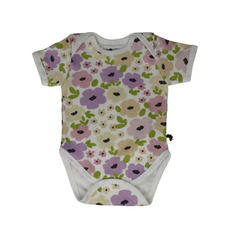 A short-sleeve baby onesie featuring a charming mauve, cream, and purple floral pattern on a white background, made from a soft cotton-lycra blend.