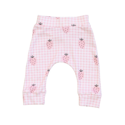 Pink checkered baby pants with strawberry pattern on a white background