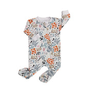 Front view of Footy Romper - Cat Lover with playful cat and floral print, cotton/lycra fabric, enclosed feet and zip closure.