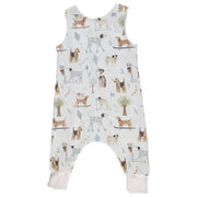 Back view of a White harem romper with a playful dog playground print from BabaFishees.