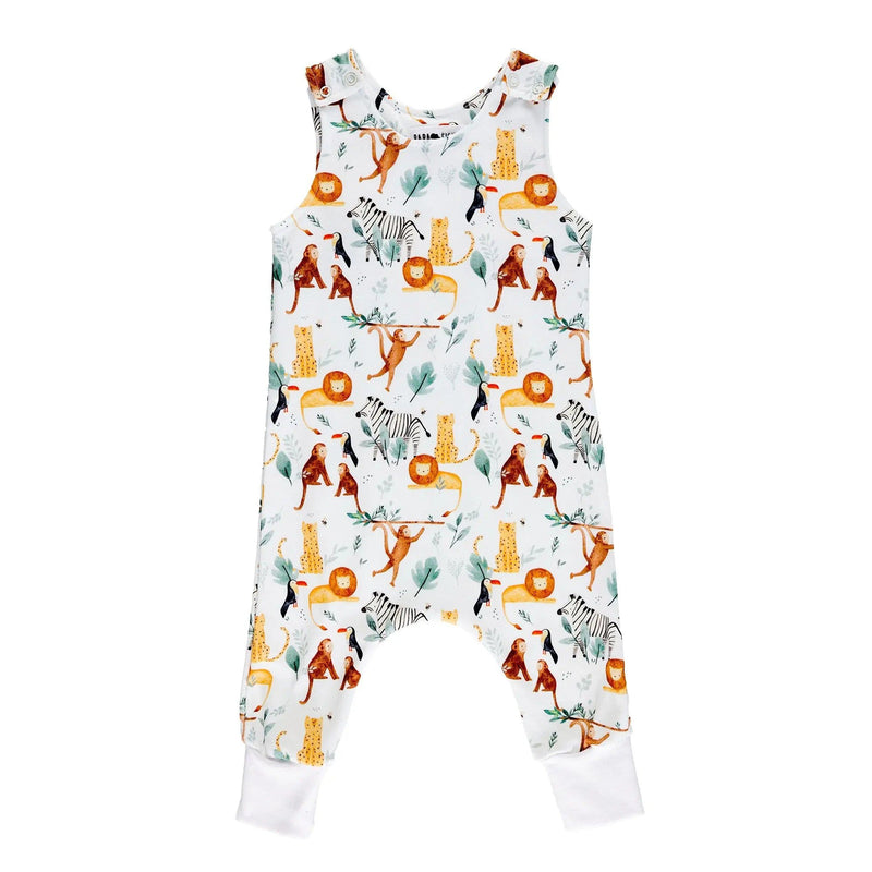 Front view of a harem romper with hand-painted jungle animals, including lions, giraffes, and monkeys, alongside lush tropical greenery on a white stretchy cotton fabric.