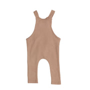 Back View of Knot Dungarees Long Leg in Mocha waffle weave cotton with knotted straps, front pocket, and relaxed fit for easy layering.