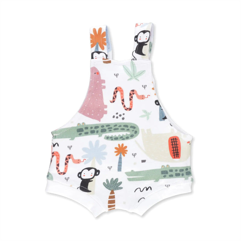 Back view of a White knot dungaree featuring a playful safari print with  crocodiles, monkeys, snakes and rust-coloured elephants from BabaFishees