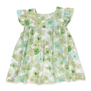 Back view of a Mocca dress with a soft green watercolour floral print and ruffled sleeves from BabaFishees