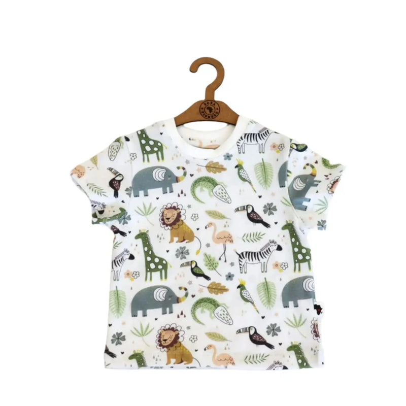 A children’s T-shirt featuring a safari-themed print with lions, zebras, giraffes, elephants, and greenery, perfect for casual and stylish wear.