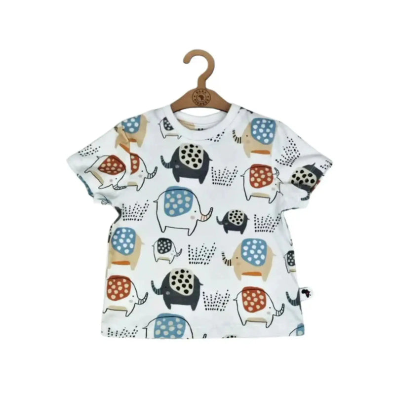 Tee Shirt – Edward the Ellie featuring multicoloured elephants in blue, rust, beige and navy on white.