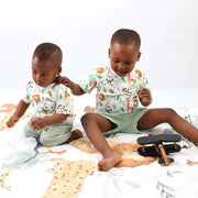 Two children playing with toys wearing Simba Watercolour print tee shirts from Baba Fishees.