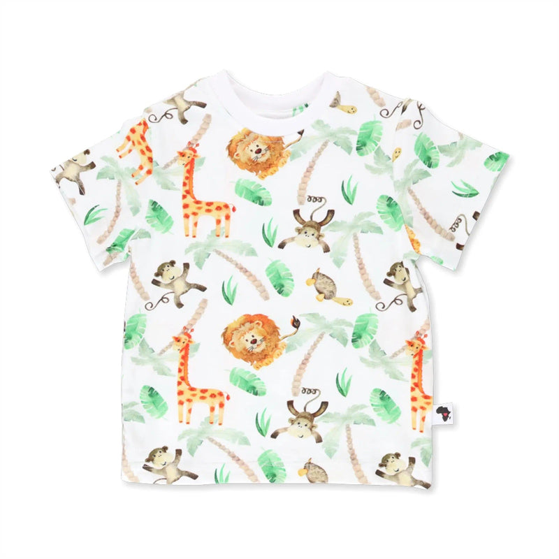 Tee Shirt - Simba Watercolour is a White baby tee shirt featuring watercolour-style illustrations of lions, giraffes, monkeys, tropical leaves, and palm trees. Made from a soft cotton-lycra blend with a slightly baggy fit for comfort.