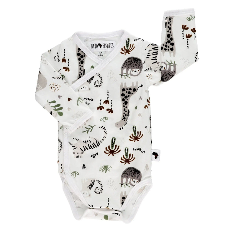 Front view of a White long-sleeve wrap onesie featuring a playful print of giraffes, sloths, zebras, and tigers from BabaFishees.