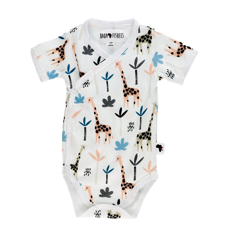 Front view of White short-sleeve wrap onesie with a playful giraffe print from BabaFishees
