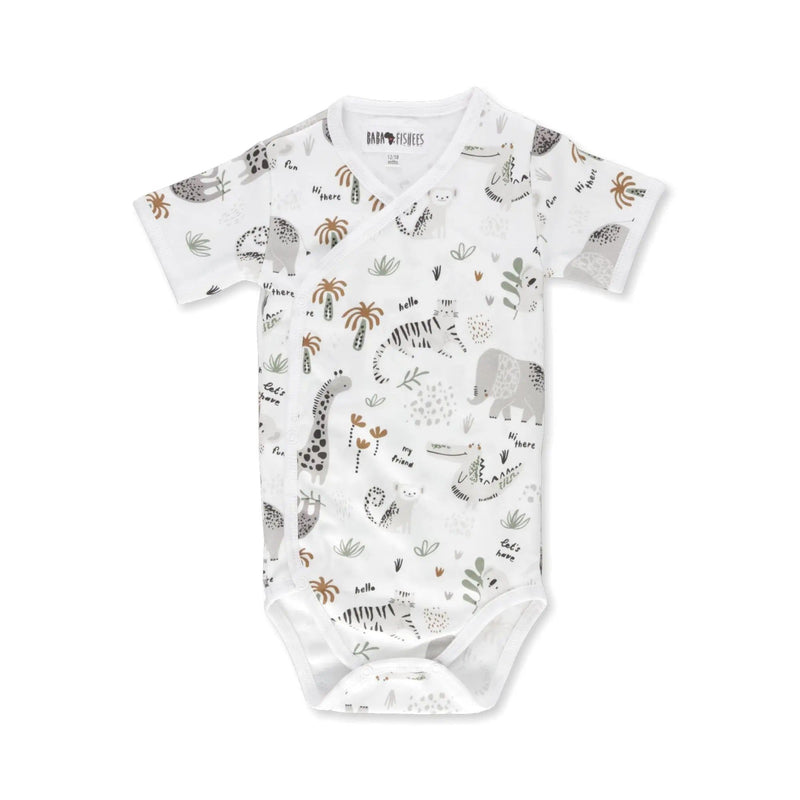 A short-sleeve wrap-style onesie featuring a safari-themed print with animals and plants on a white background, made from 95% cotton and 5% lycra.