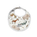A white classic baby bib with colourful illustrations of various animals, including a rhinoceros, crocodile, elephant and okapi, along with green leaves scattered throughout the design.