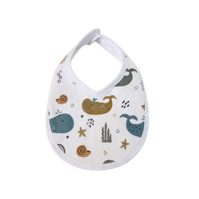 Bib - Whales on White white cotton baby bib with blue, grey and mustard whale print