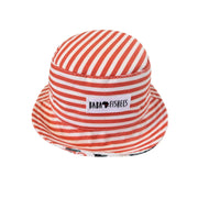 Bucket Hat – Rust Ellie reversible cotton sun hat rust-and-white stripe with safari animal print on reverse