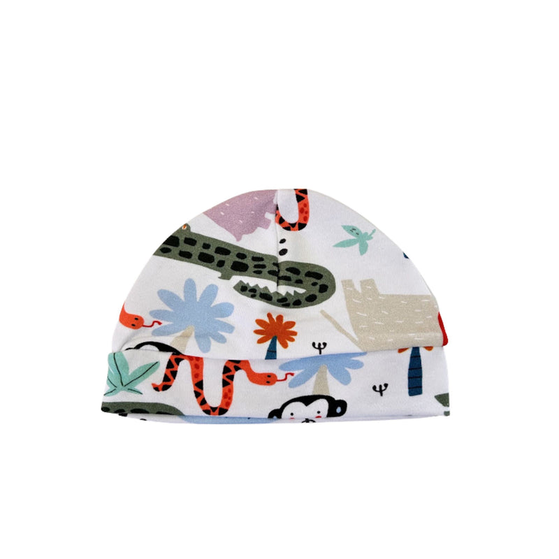 Classic beanie featuring a vibrant jungle-inspired print with monkeys, crocodiles, and bright colours on soft white cotton fabric.