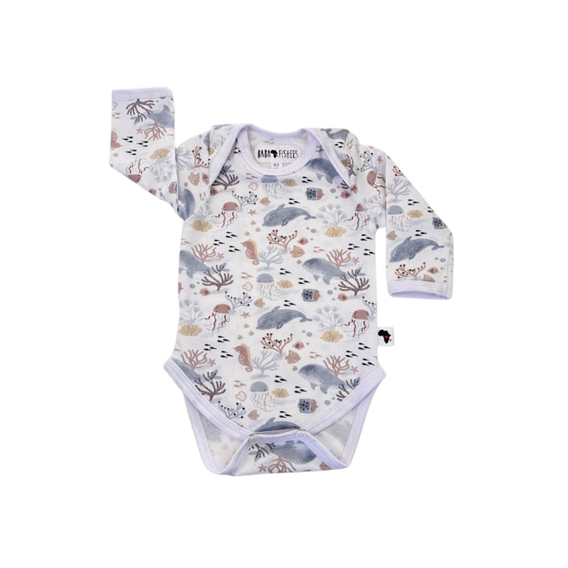 Front view of a white Classic Onesie - Fin and Friends with long sleeves, an envelope neckline and an all-over dolphin, whale, jellyfish, seahorse, fish and coral print