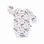 Front view of a white Classic Onesie - Fin and Friends with long sleeves, an envelope neckline and an all-over dolphin, whale, jellyfish, seahorse, fish and coral print