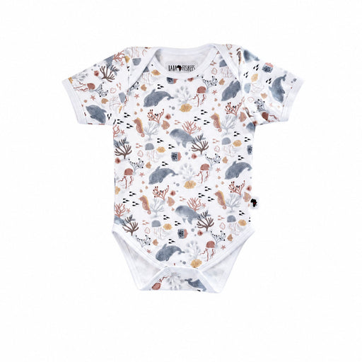 Front view of a white Classic Onesie - Finn and Friends with short sleeves, an envelope neckline and a muted dolphin, whale, jellyfish, seahorse, fish and coral print