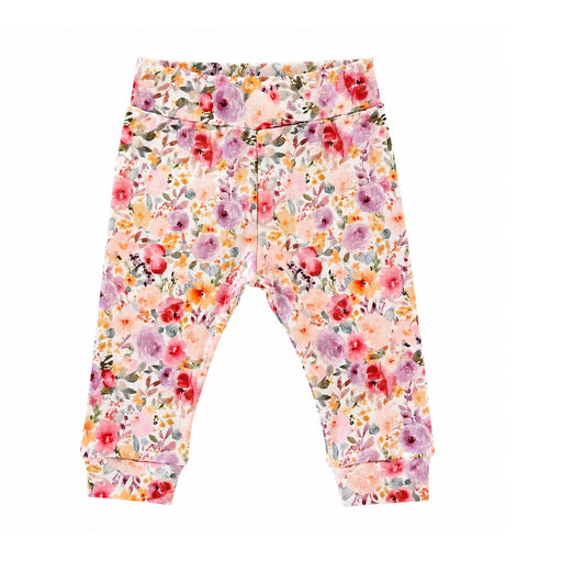 A pair of toddler girls' floral print pants with a high waistband and cuffed ankles, featuring a dense pattern of pink, red, orange, and purple flowers with green leaves on a white background.
