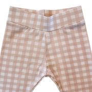 Waist close-up: Close-up of the wide stretchy waistband on the pink Comfy Pants - Gingham