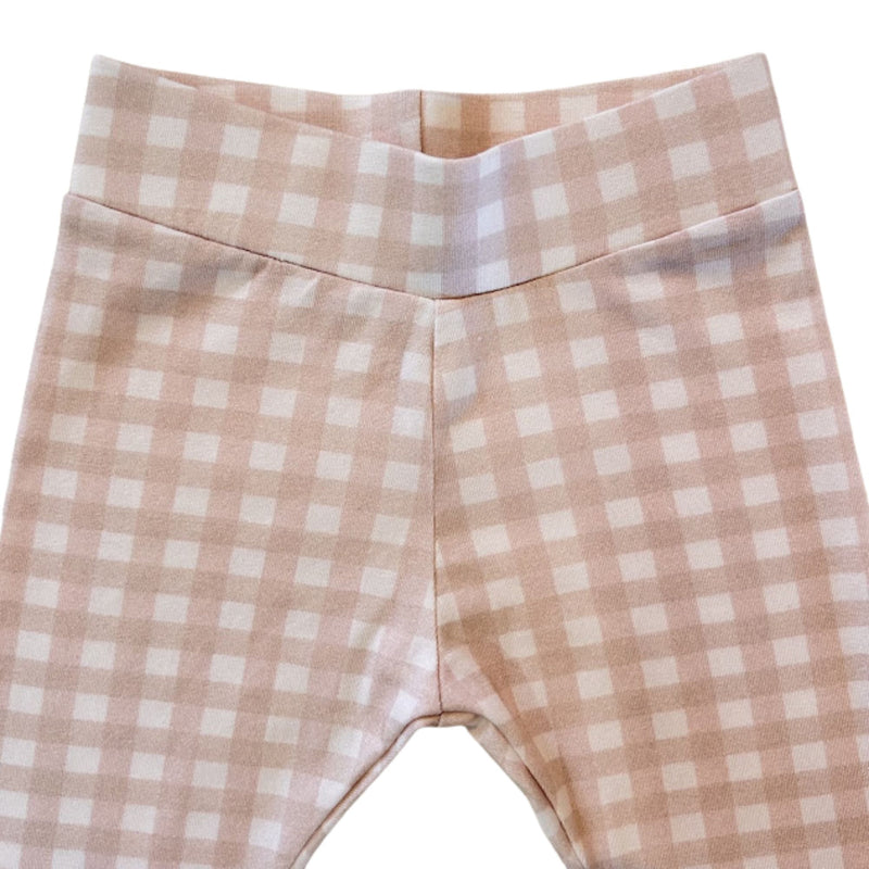 Waist close-up: Close-up of the wide stretchy waistband on the pink Comfy Pants - Gingham
