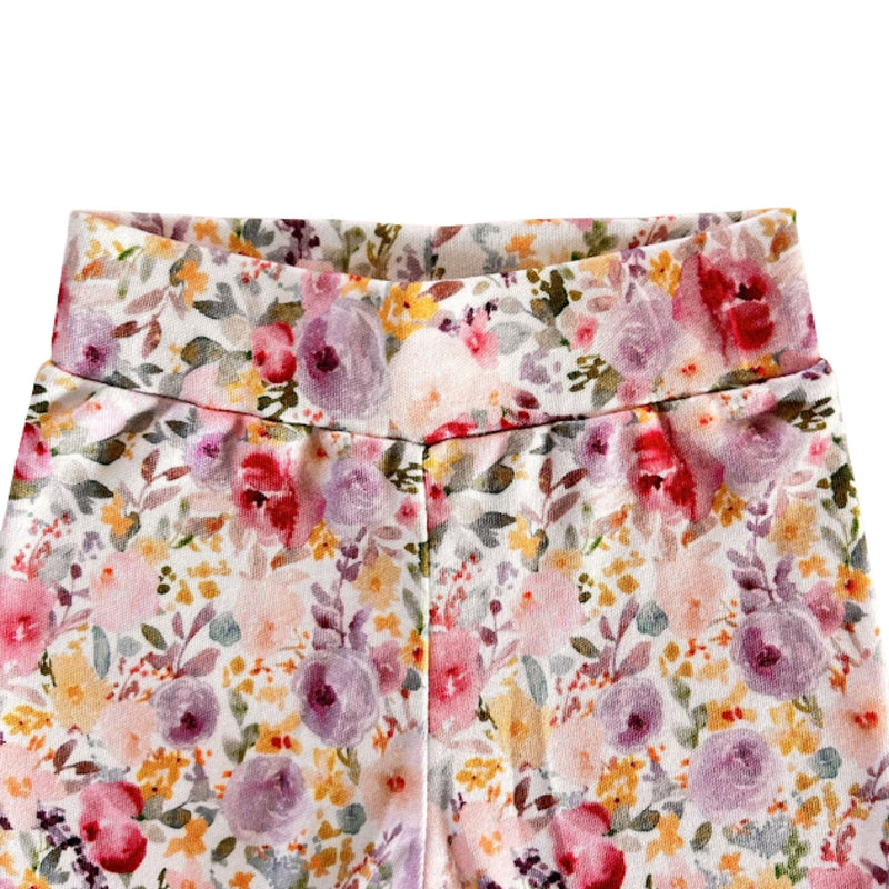 Waistband view of Cuff Pants - Floral Fantasy with pink, purple and orange floral print and cuffed ankles