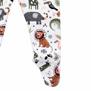 Close-up of Footy Pants – African Plains showing the enclosed foot and ankle seam, with a rust lion, grey elephant, green crocodile and peach flamingo on white fabric.