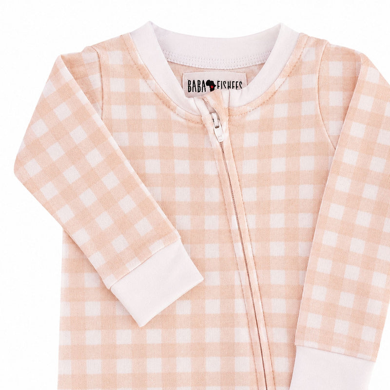 Closeup view of Footy Romper - Pink Gingham 100% cotton interlock baby sleepsuit with front zip and footed legs