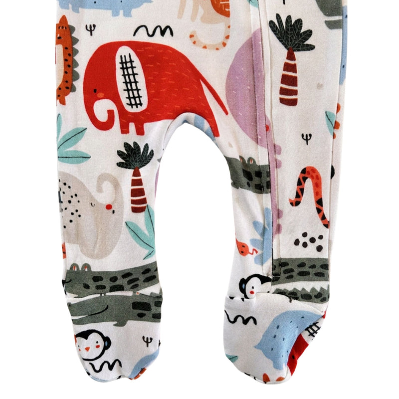 White Footy Romper - Rust Ellie with colourful elephants, hippos and crocodiles - closeup of legs