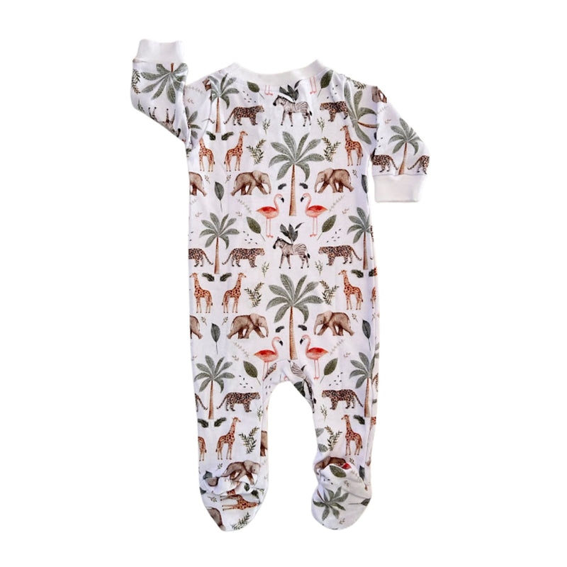 A baby footed sleeper with long sleeves and an all-over safari-themed print featuring giraffes, elephants, palm trees, flamingos, zebras, and birds on a white background.