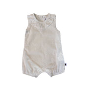 Front view of the Baba Fishees Frilly Neck Romper Anglaise in white, featuring a gathered frill neckline, sleeveless design, delicate eyelet embroidery and elasticated leg openings.