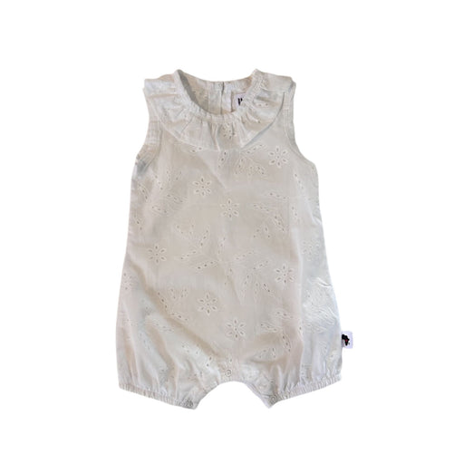 Front view of the Baba Fishees Frilly Neck Romper Anglaise in white, featuring a gathered frill neckline, sleeveless design, delicate eyelet embroidery and elasticated leg openings.
