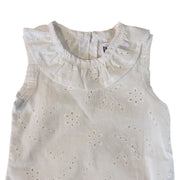 Close-up of the Frilly Neck Romper’s gathered white neckline, highlighting the delicate broderie anglaise embroidery and neat edge finishing.