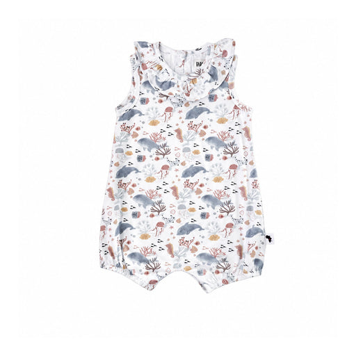 A sleeveless baby romper with a ruffled collar, featuring an all-over dolphins and sea life print in muted gray, brown, and beige tones on a white background.