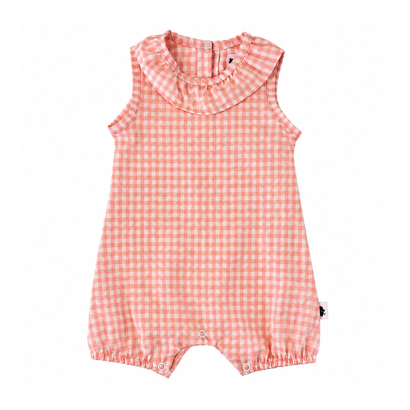 Frilly Neck Romper in peach gingham with tiny white textured dots, a ruffled neckline, sleeveless arms, elasticated leg openings and three crotch press studs.