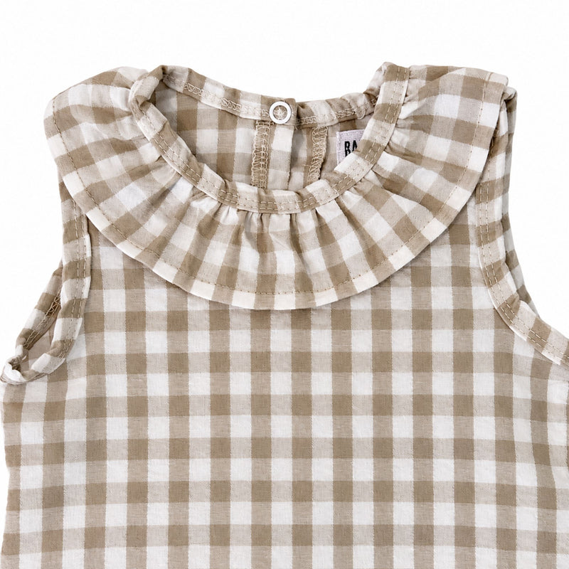 Frilly Neck Romper Gingham - Stone neckline detail, showing the gathered frill, bound neckline and armholes, stitching and woven checked texture.