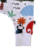 Harem Romper - Rust Ellie white ankle cuff and colourful animal print close-up