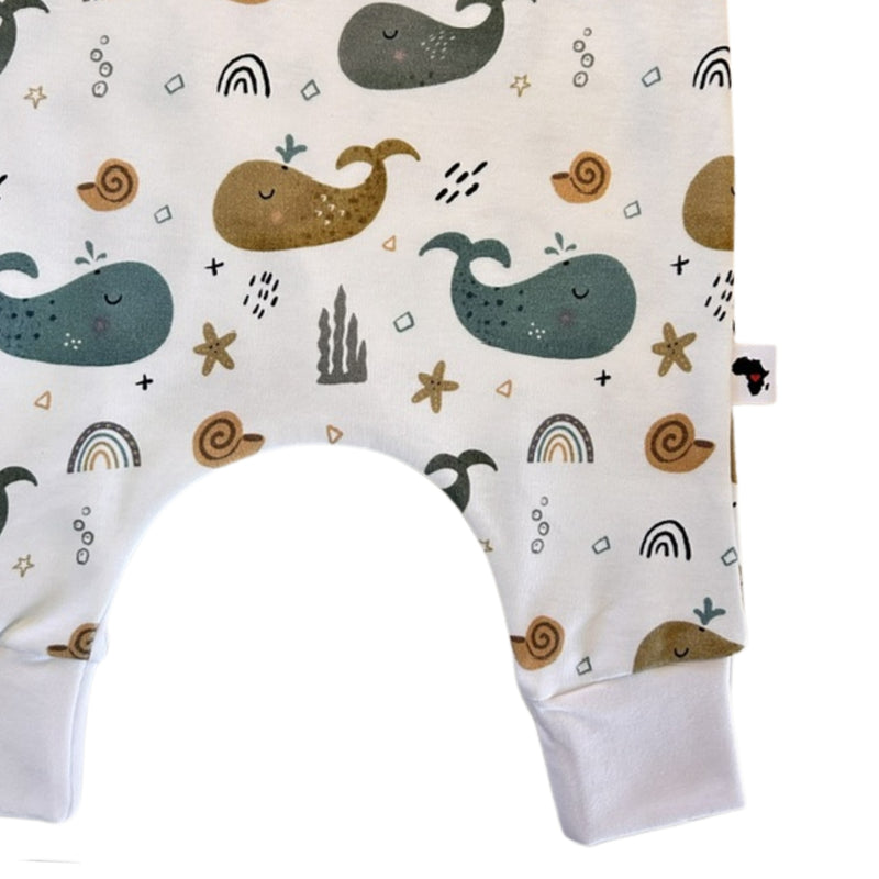 Harem Romper - Whales on White white ankle cuff and colourful whale print close-up