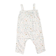 Back view of Jump Suit - Tweety Bird - White baby jumpsuit with pastel bird print, adjustable shoulder straps and loose fit