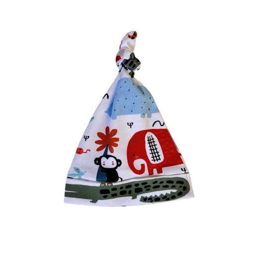 Knot Beanie - Rust Ellie baby beanie with colourful elephant, monkey and crocodile print on white fabric