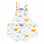 Knot Dungaree - Crab Gang in white with orange and blue crab print, sea-inspired details and knot shoulder straps