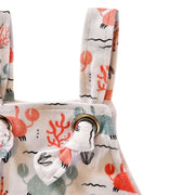 Knot view  of Knot Dungaree - Crab Gang in white background with pink and pale blue crabs print, sea-inspired details and knot shoulder straps
