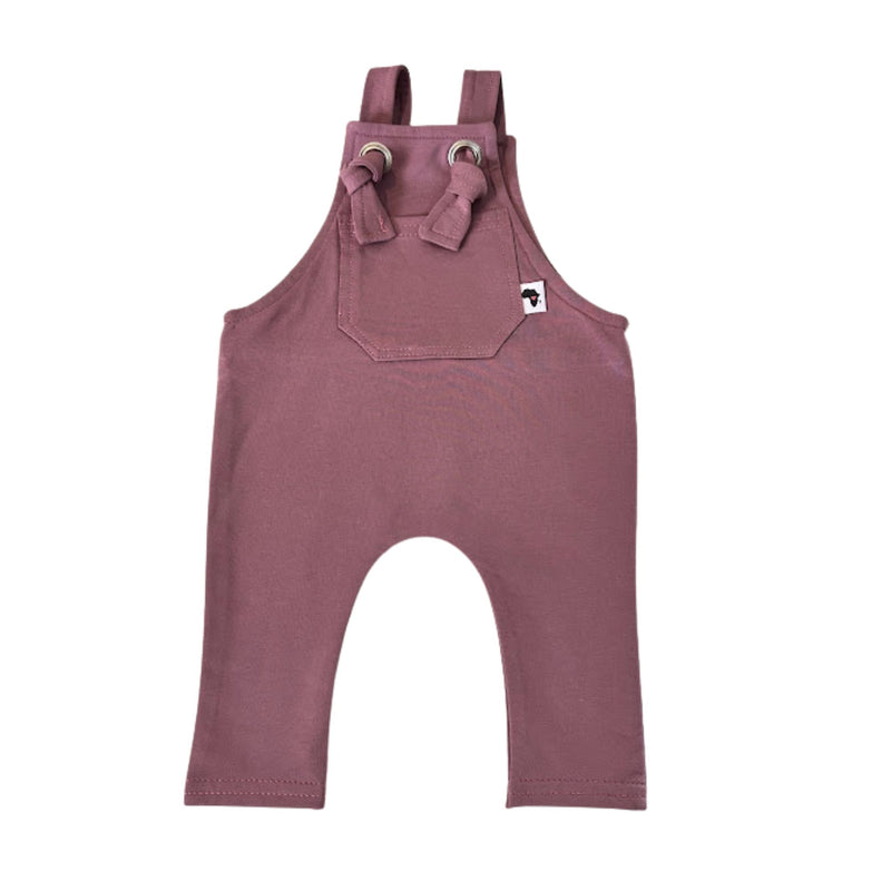 A grape coloured knot dungaree long leg with adjustable shoulder straps and a front pocket with a small white Baba Fishees brand tag.