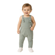 Baby wearing sage green long leg knot dungarees